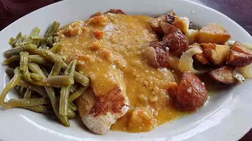 Fish topped with crawfish etouffee at Ralph and Kacoo's. 