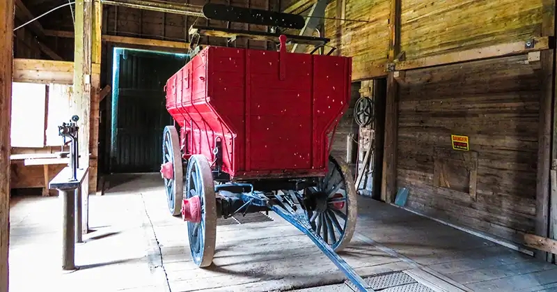 Historic grain wagon with hitch for horses.