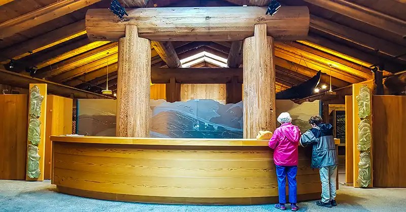Cedar poles in the Museum of Northern British Columbia entrance