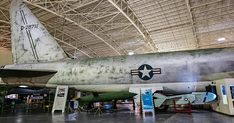 Missiles alongside a  war plane