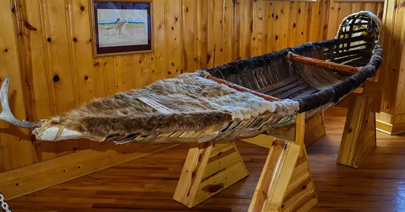 Canoe designed to maintain balance in rough waters. 