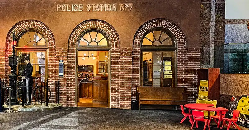 Exterior of Police Station No. 7 with outside rest area for visitors.