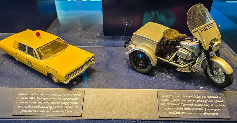 Four-door police cars introduced in 1960s and the 1950s 3-wheeled motorcycles. Photo by Linda Aksomitis.