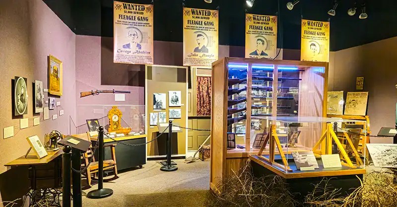 Gallery featuring wanted posters and stories.