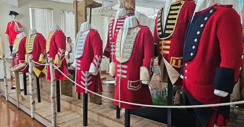 Red "justaucorps" or coats worn by the British infantry during the 1700s period.