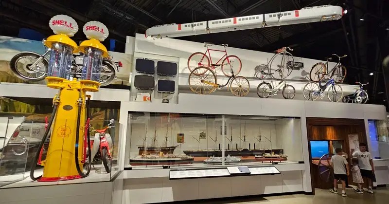 Vintage gas pumps and bicycles in the Canada Science and Technology Museum