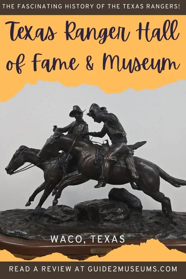 Statue of Texas Ranger and an outlaw.