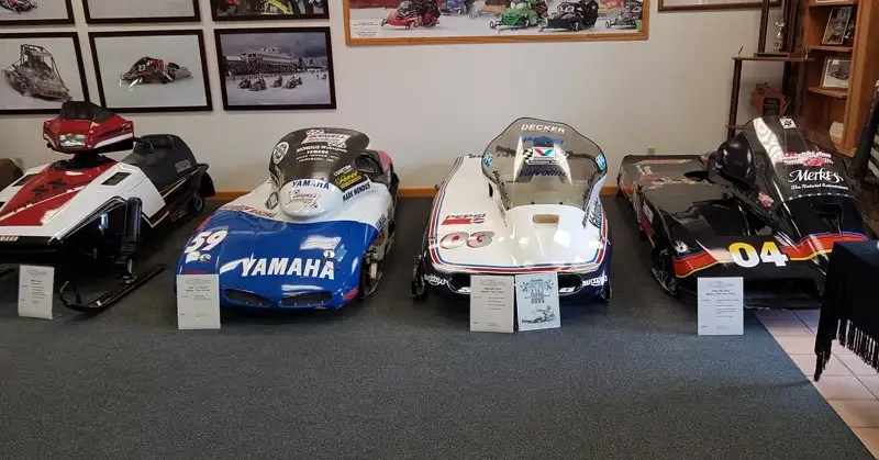 Snowmobiles that competed in the Eagle River World Championship races. Sleds at the World Snowmobile Headquarters. 