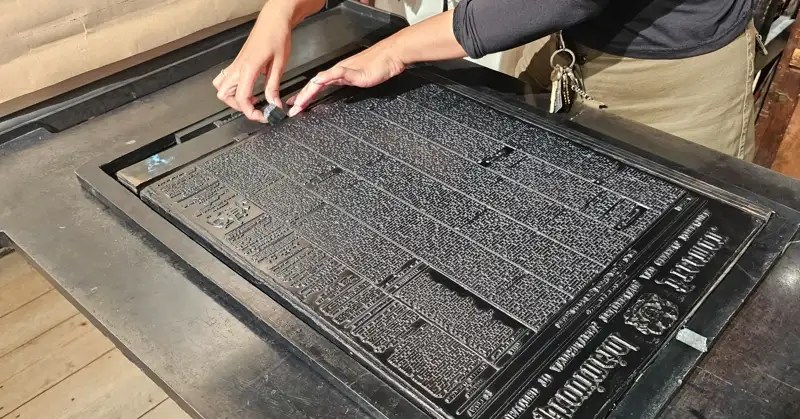 7 columns laid out with type to print a newspaper page