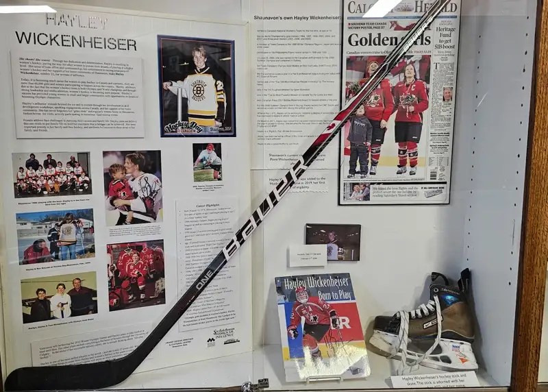 Hockey stick, skates, and write-up about Hayley Wickenheiser in her hometown museum in Shaunavon.