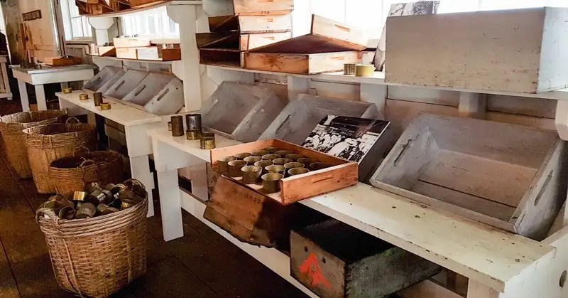 This image has an empty alt attribute; its file name is 10-north-pacific-cannery-tins.webp
Tins ready for filling with salmon.